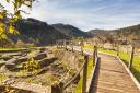 View from the top of the wooden walkway that runs through an ancient fort in Taramundi