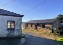 Traditional stone building with slate roof in the rural centre of Villanueva de Oscos.