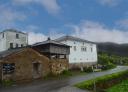 House with traditional Asturian hórreo (granary) on the turn-off to the Cascada de Méxica path.