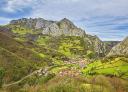 Panoramic view of La Foz with mountains from the viewpoint at Mina La Esperanza
