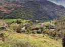 Panorámica del valle de Mier entre montañas y campos verdes