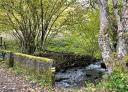 Small stone bridge over stream on Tabayón route