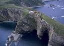 Aerial view of Cape Vidio showing the lighthouse and the impressive cliffs surrounding it.