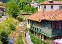 Old stone houses on the banks of the river Nonaya in Salas