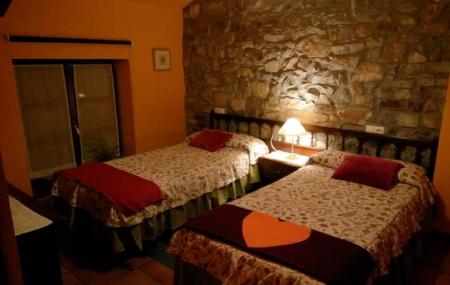 Habitación doble del apartamento rural La Llosa Rodré