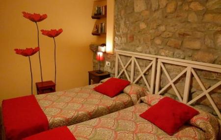 Habitación doble del apartamento rural La Llosa Rodré