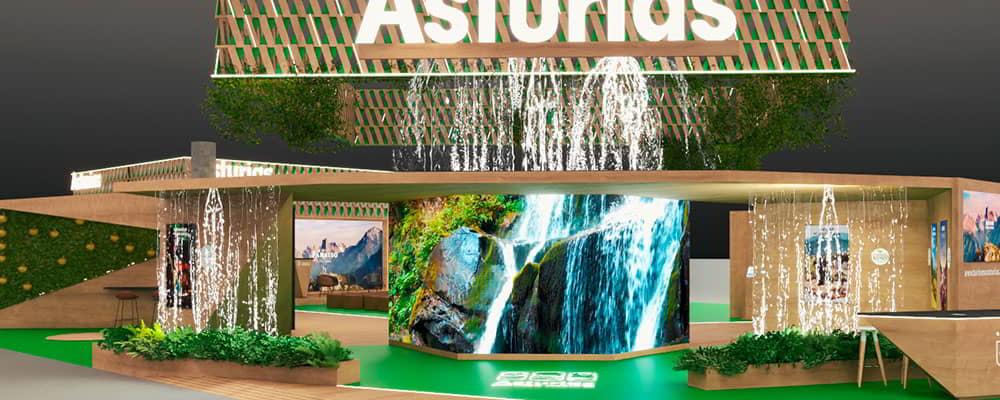 Vista principal del estand donde se ven las pantallas led y la pantalla principal grande.