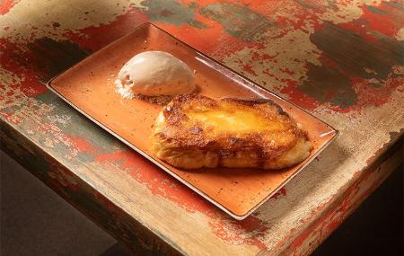 Exquisitas torrijas de La Finca Sidrería Agrobar