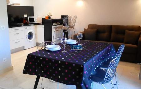 Apartamentos El Casal cocina-comedor