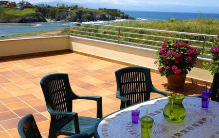 Apartamento turístico Playa de Tapia terraza