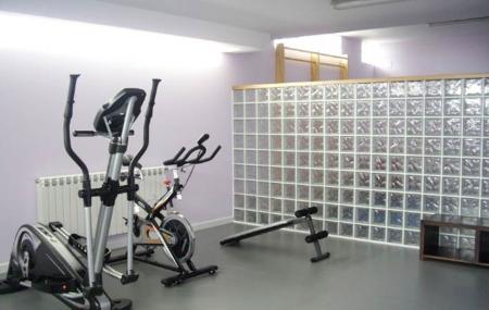 Apartamento turístico Playa de Tapia gimnasio