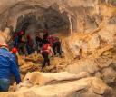 Interior of the Huerta Cave with walkways and visitors on guided tours